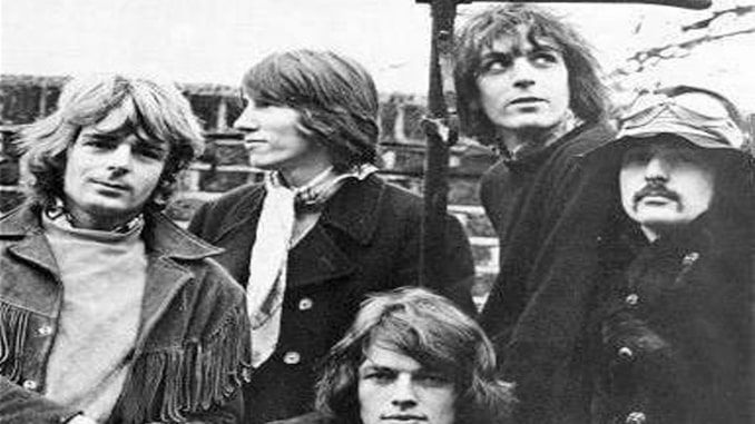 Syd Barrett (second from right) takes a photo with the members of Pink Floyd