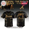 Black baseball jersey with The Eagles band logo, Atlanta Braves design, and anniversary details.