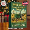 The John Deere Advent Calendar set against a Christmas tree backdrop with festive decorations.