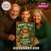 Family holding the Smokey Bear Advent Calendar in front of a Christmas tree.