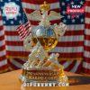 A golden and silver Marine Corps 250th anniversary model with American flags in the background!