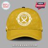 Gold White Sox cap for Childhood Cancer Awareness Month with heart ribbon logo.