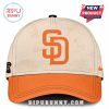 Padres cap with orange brim and SD logo, featuring faded tour graphics.