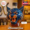 A fierce blue cat head bottle with sharp features and a regular lid.