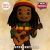 Close up of a crochet Bob Marley doll.
