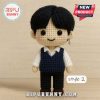 Crocheted Kim Nam-joon plush doll wearing a grey vest and a black tie!