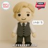 Crocheted J-Hope plush doll wearing a red coat and a bow tie!