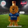 Golden lion Chelsea mascot bottle with cork cap on football field.