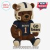 Football-themed crochet bear with helmet and cheer sign on white background.
