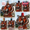Tiger-shaped bottle with various cap designs in green, red, wooden, and crown styles.
