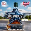 Dallas Cowboys whiskey bottle in Style 4 with a red cap and star-shaped design.