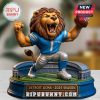 Detroit Lions mascot figure on a tabletop with soft background.