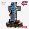 Detroit Lions themed cross with scripture, American flag, helmet, and football on light background.