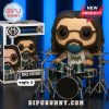 Mike Portnoy figure with green drum kit and sunglasses.