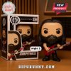 John Petrucci vinyl figure with red guitar and long hair.