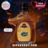 An alligator shaped whiskey bottle with a crown crest and Gators logo!