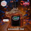 An alligator shaped whiskey bottle with a blank black label and the Gators logo!