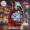 Grenade shaped liquor bottle with U.S. Coast Guard logo.