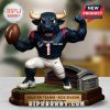 Houston Texans mascot figure displayed on a table with blurred background.