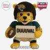 A crochet Jacksonville Jaguars mascot bear standing on a white background holding a football and a DUUUUVAL sign!
