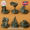 Set of six tropical themed Monopoly tokens including parrot, margarita glass, guitar, flip flops, sailboat, and hat.