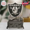 Las Vegas Raiders acrylic standee in indoor room with blurred background.