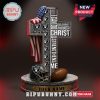 A cross with Las Vegas Raiders logos, a football helmet, and the American flag, featuring the verse 