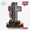 A cross featuring Las Vegas Raiders logos, a football helmet, and an American flag, with the Christian quote
