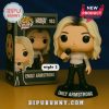 Emily Armstrong Funko Pop with mic, white top, leather pants, and blonde hair next to product box.