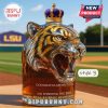 Tiger head decanter with a gold and purple crown as the stopper!