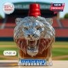 Lion head liquor bottle with red wax cap.