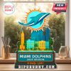 Miami Dolphins standee on sunny windowsill with city and dolphin design.