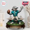 Miami Dolphins dolphin mascot statue displayed on a shelf in a room.