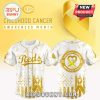 Cincinnati Reds jersey in white and gold for Childhood Cancer Awareness Month.