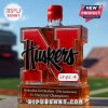Nebraska Huskers commemorative whiskey bottle style 4 with a red sealed cap.