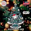 Philadelphia Eagles Christmas tree ornament with team logos and festive decorations.