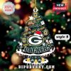 Green Bay Packers Christmas tree ornament with team logos and festive details.