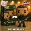 Funko Pop Vinyl figure of Ryan Peake holding V-shaped guitar in black outfit.