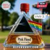 Pink Floyd style 2 liquor bottle with a red stopper, black prism and rainbow flag.