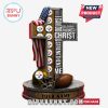 A detailed view of the personalized Steelers cross with a football helmet, flag, and logos.