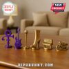 Monopoly Prince Edition tokens including Prince symbol, guitar, microphone, boot, keyboard, and motorcycle.