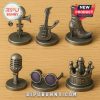 Set of six metallic Prince-themed Monopoly tokens including guitar and crown.