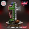 Seattle Seahawks cross-shaped statue with Bible verse and football elements.
