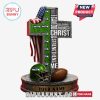 Bright Seattle Seahawks themed Christian cross with football helmet and flag.