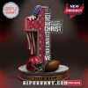 A cross decorated with Tampa Bay Buccaneers logos, a football helmet, and the American flag, featuring the Christian quote 