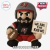 Crocheted Tampa Bay Buccaneers player doll with a football and a 
