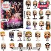 Multiple figurines of Taylor Swift dressed in various styles from her Eras Tour.