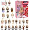 Taylor Swift figurines in different poses and outfits from her music video moments.