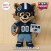 Tennessee Titans crochet doll holding a Titan Up sign and football.
