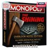 Box cover of Monopoly The Shining Overlook Hotel Edition with axe and maze design.
